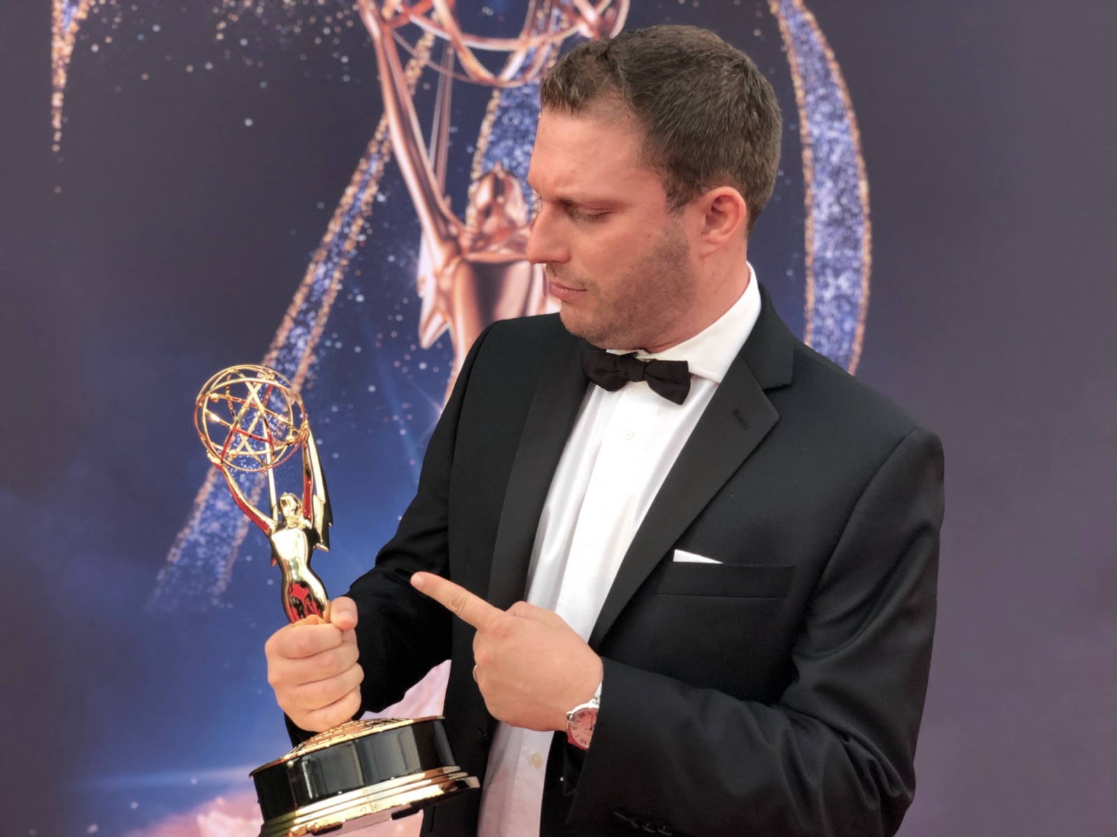 Benjamin Green with the Emmy Award